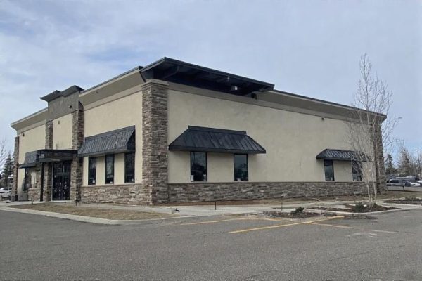 Depend Exteriors specializes in EIFS stucco repair and installation in Sherwood Park, AB. This image shows a commercial building with a fresh exterior insulation and finish system applied—highlighting smooth surfaces, moisture-resistant coatings, and decorative mouldings. Serving both residential and commercial clients, Depend Exteriors uses industry-approved methods for long-term durability and weather protection.