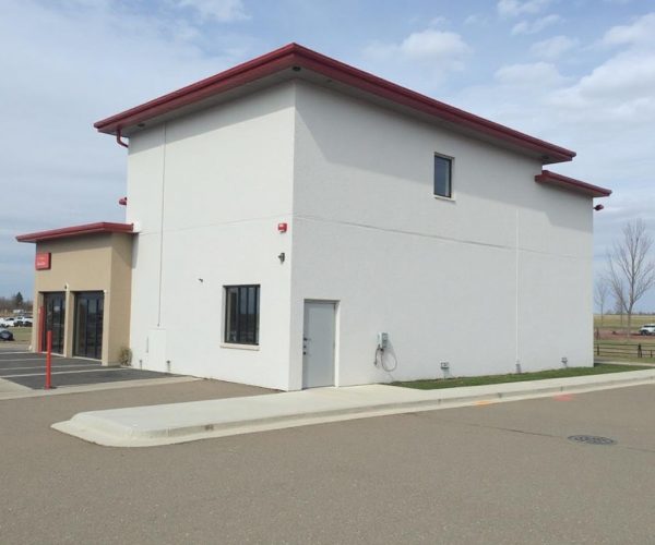 Home exterior EIFS stucco painting and repair service in Allendale AB.