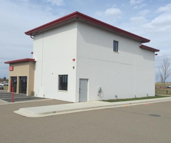 Home exterior EIFS stucco painting and repair service in Allendale AB.